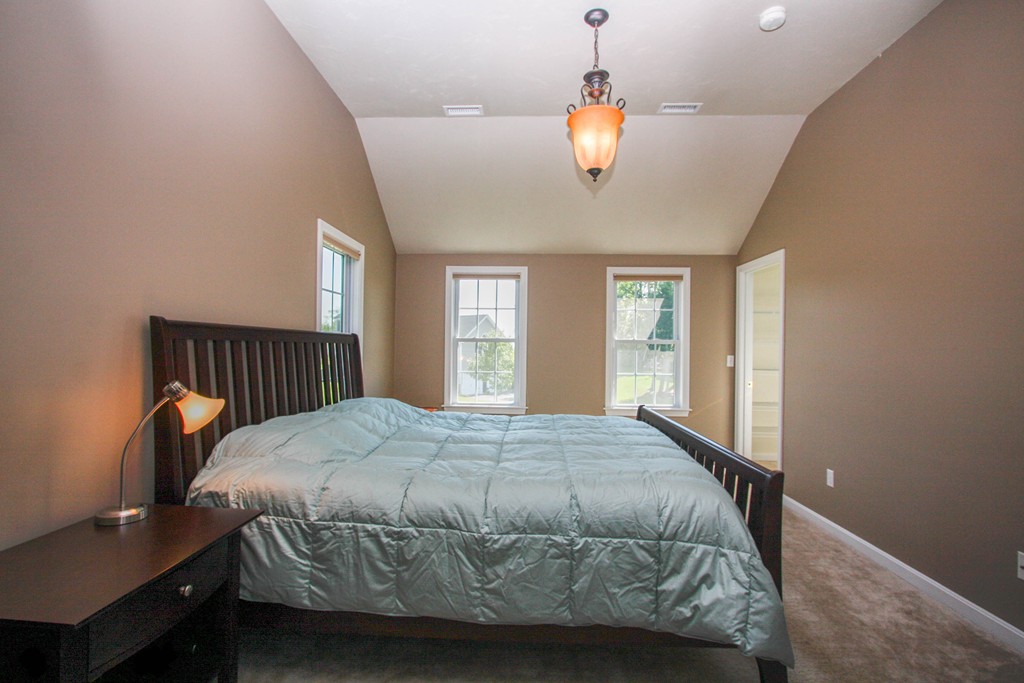 13 Clealand Circle Rutland, MA 01543 - Photo 18 of 30 a bedroom with a bed and window