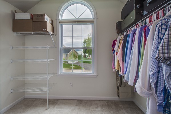 13 Clealand Circle Rutland, MA 01543 - Photo 19 of 30 a view of walk in closet with clothes and shoes