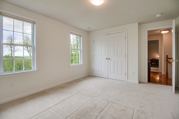 13 Clealand Circle Rutland, MA 01543 - Photo 21 of 30 a view of an empty room with a window and bathroom