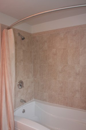13 Clealand Circle Rutland, MA 01543 - Photo 23 of 30 a bathroom with a shower and a bath tub