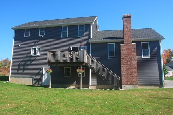 13 Clealand Circle Rutland, MA 01543 - Photo 26 of 30 a front view of a house with a yard