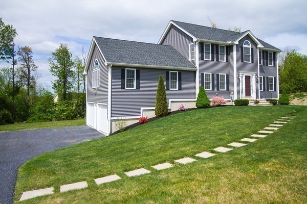 13 Clealand Circle Rutland, MA 01543 - Photo 30 of 30 a front view of a house with a yard