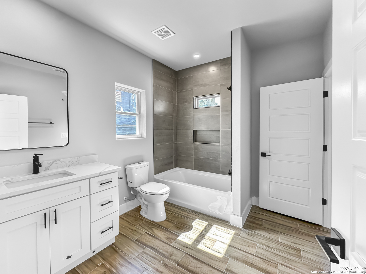 301 Hiram Cook Blanco, TX 78606 - Photo 13 of 16 a bathroom with a sink and a mirror