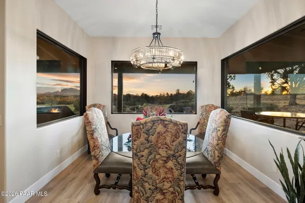 a bedroom with a bed chair and a window