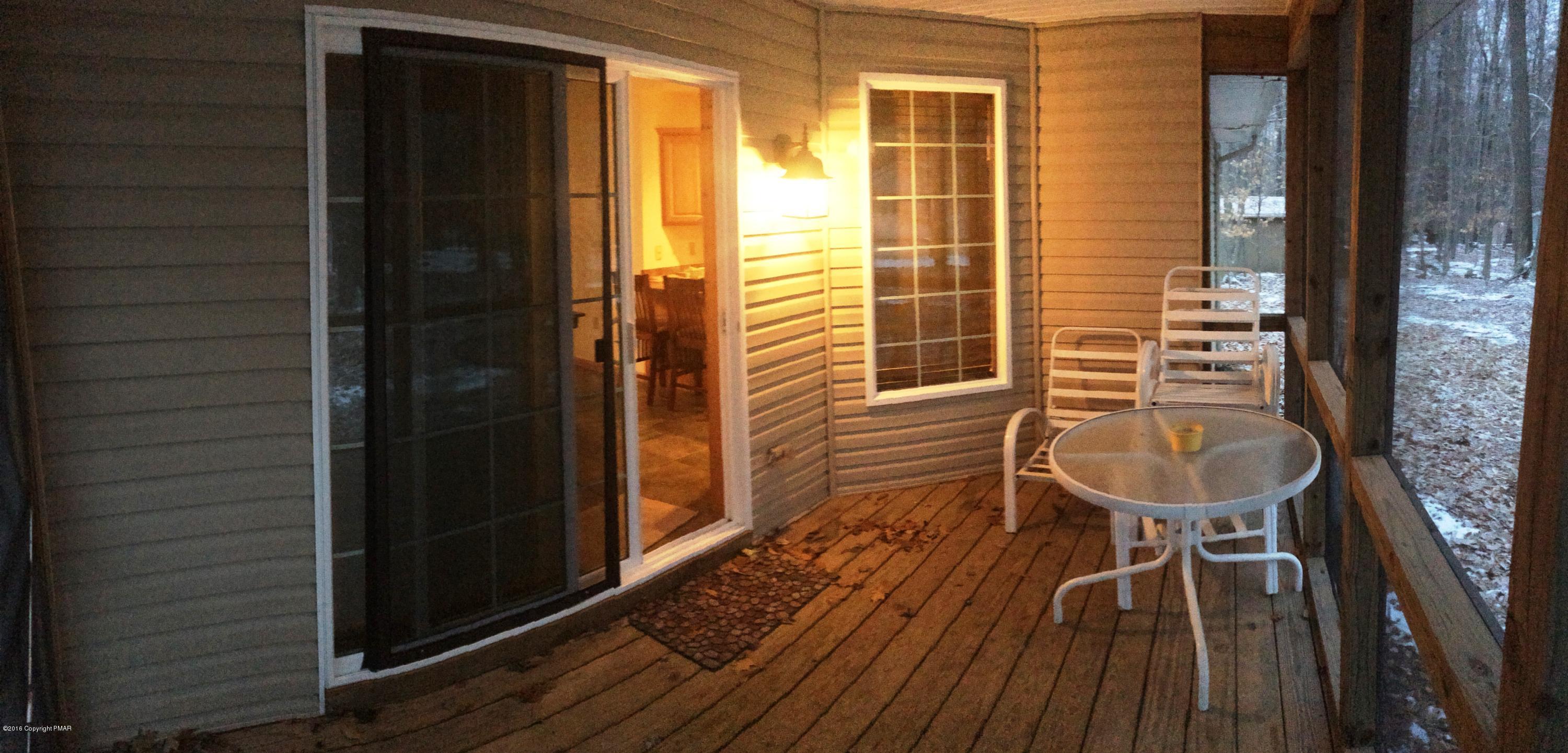 174 Ridge Road Pocono Lake, PA 18347 - Photo 19 of 41 Callaghan Screened Deck