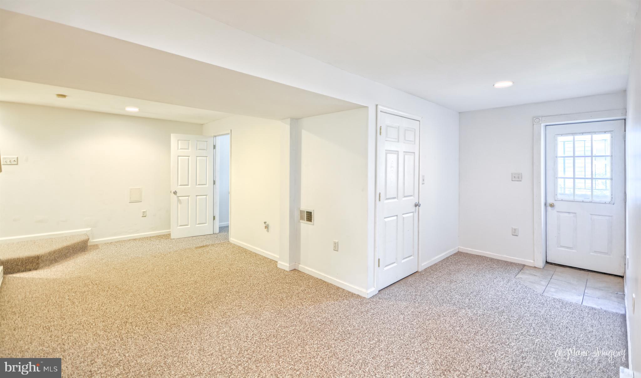 6801 Lake Point Overlook New Market, MD 21774 - Photo 22 of 28 Rec Room with Access to Rear of Home