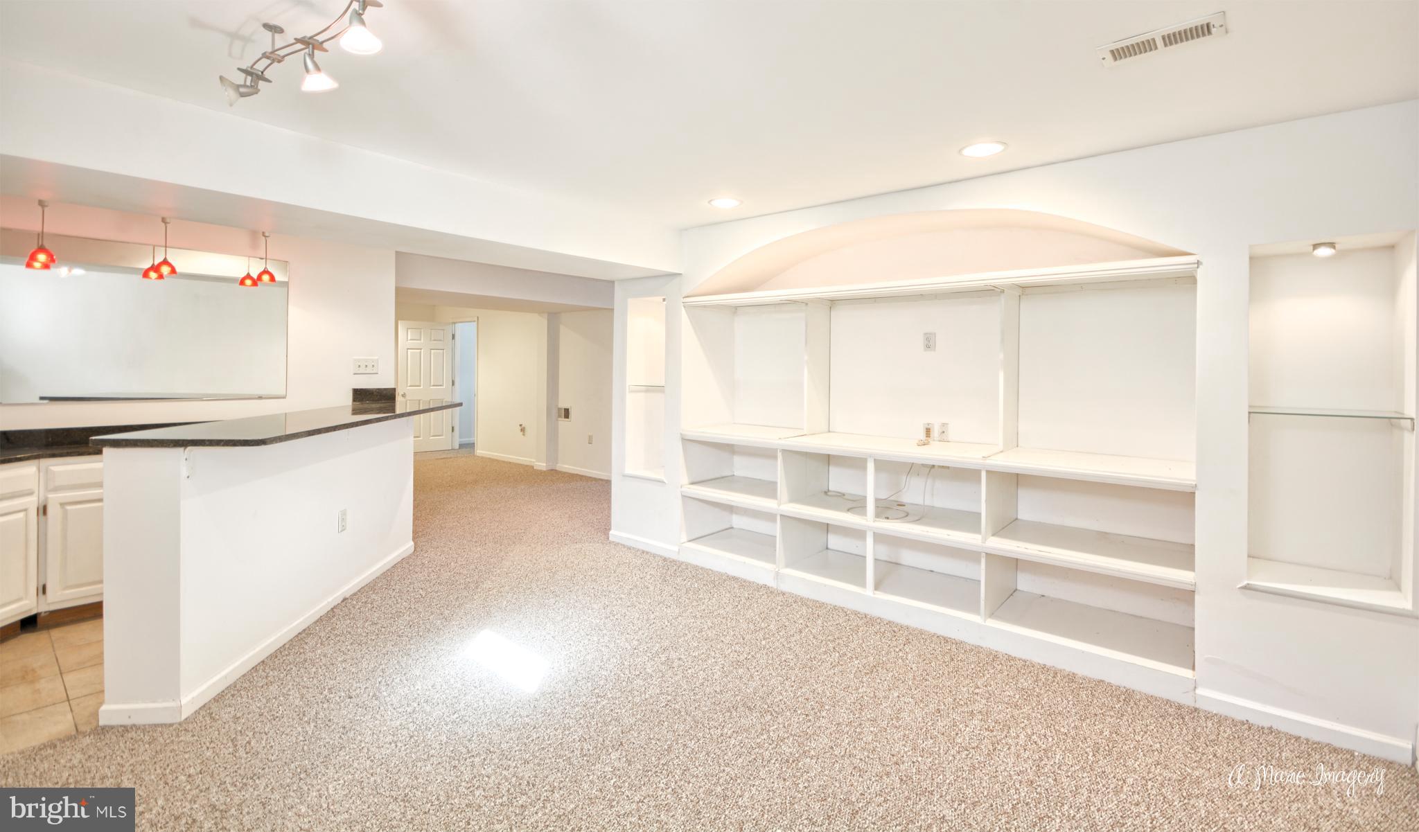 6801 Lake Point Overlook New Market, MD 21774 - Photo 24 of 28 Rec Room with Built-in Shelving