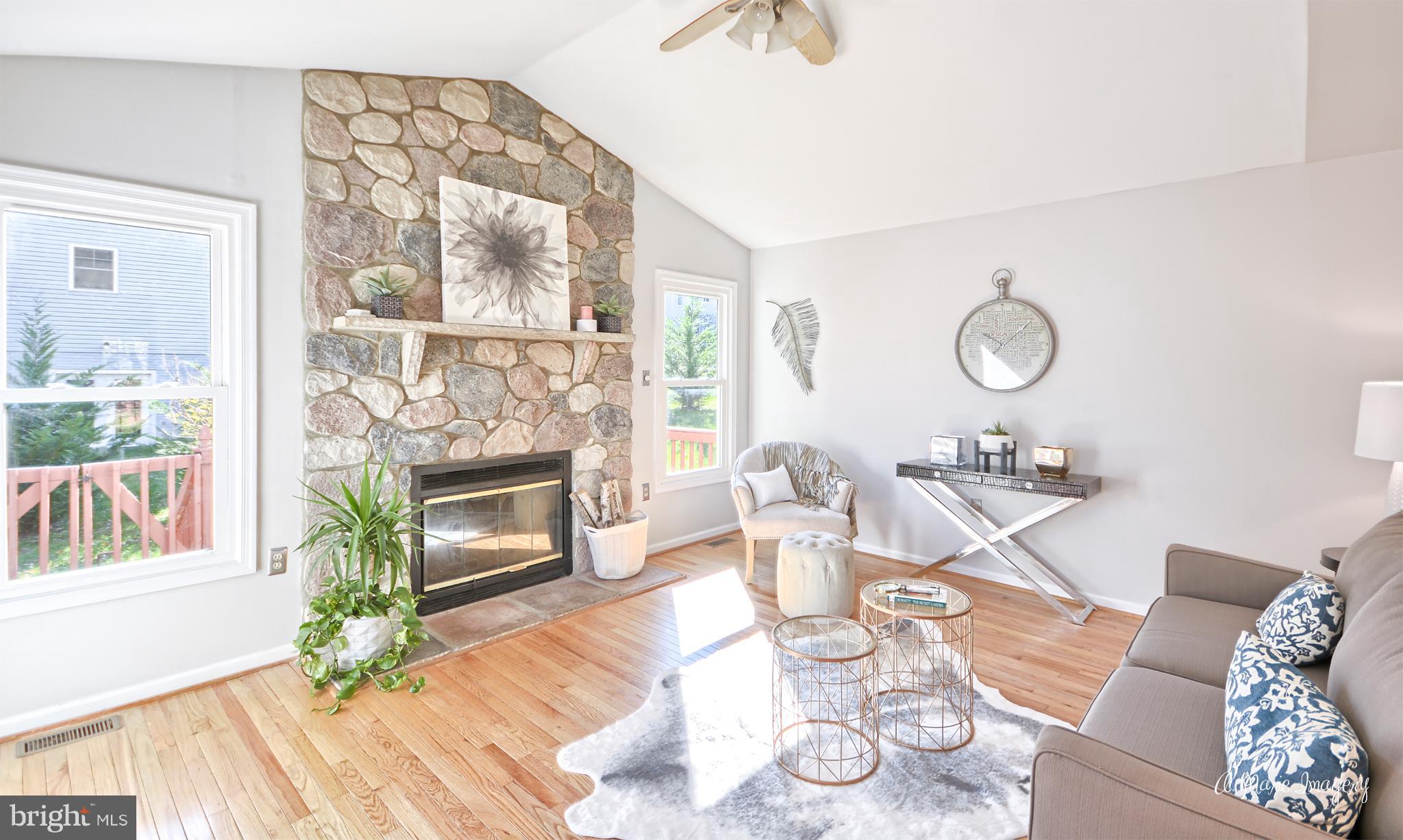 6801 Lake Point Overlook New Market, MD 21774 - Photo 10 of 28 Family Room with Stone Wood Burning Fireplace