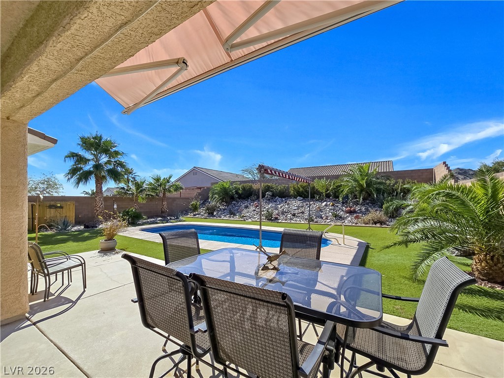 2485 Morrow Ridge Place Laughlin, NV 89029 - Photo 30 of 40 An inviting pool area awaits, perfect for leisure and outdoor entertaining.
