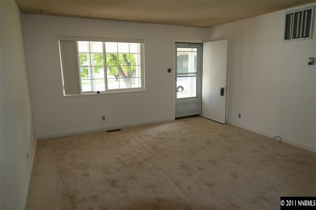 3445 Downey Avenue Reno, NV 89503 - Photo 4 of 11 an empty room with windows