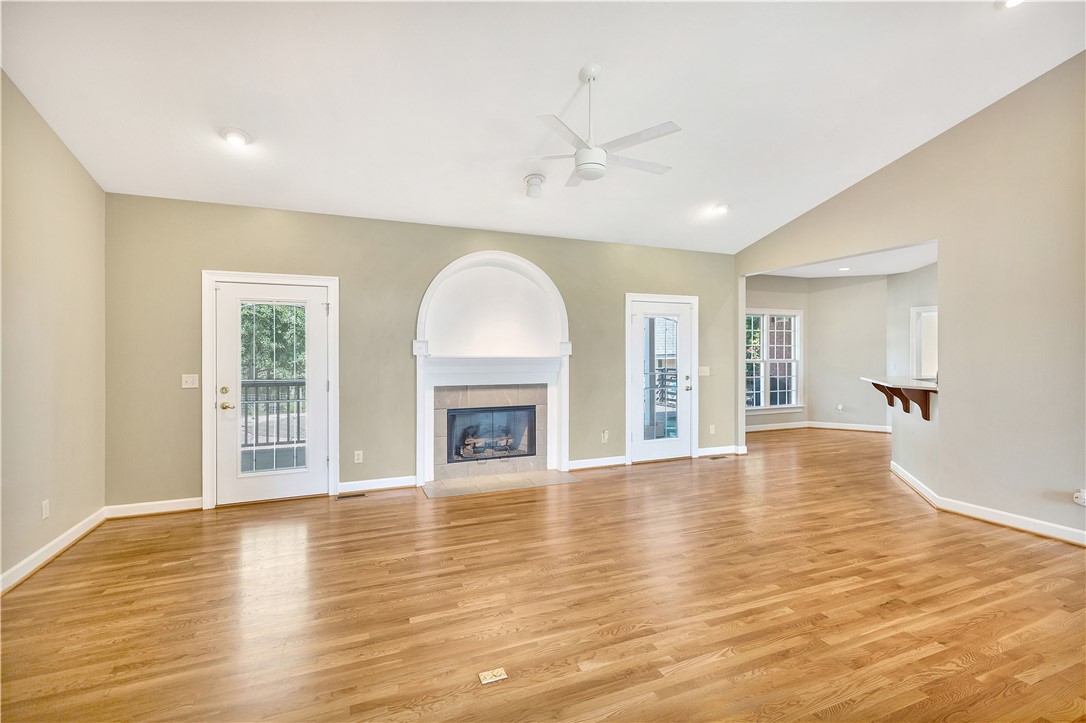 3620 Centerville Road Anderson, SC 29625 - Photo 25 of 49 Polished hardwood floors and a brick-accented fireplace define this welcoming, airy space.