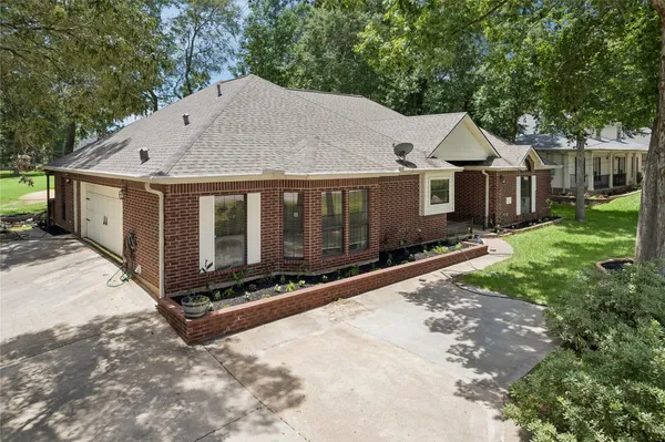 $375,000 | 154 7 Coves Road, Conroe, TX 77304