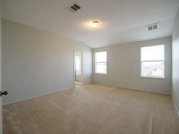 an empty room with windows