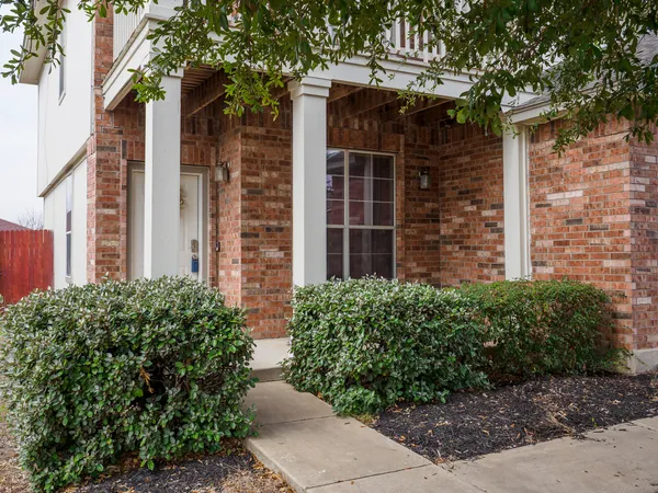 a view of a house with a garden