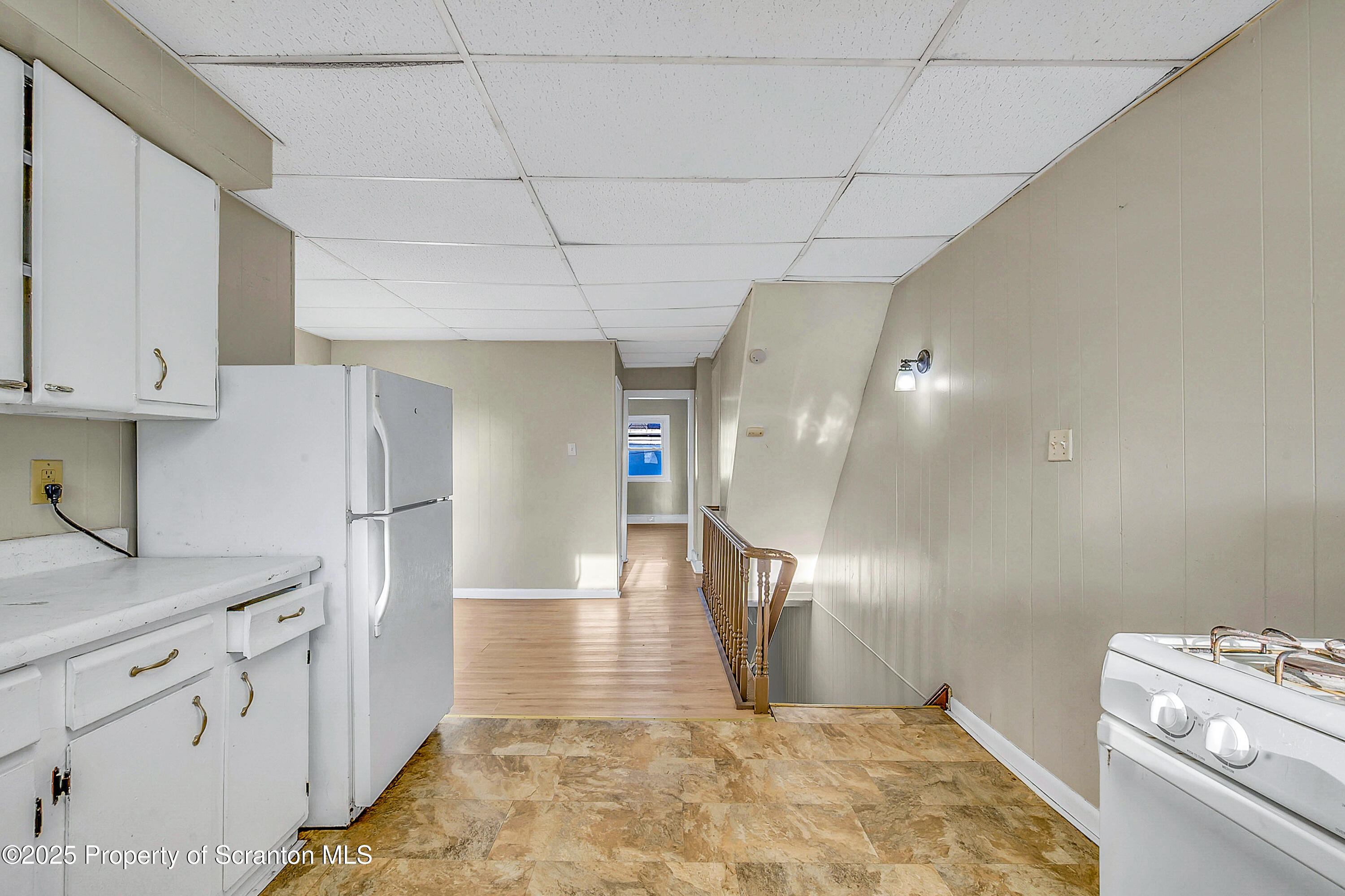 1011 Washburn Street, Unit 2 Scranton, PA 18504 - Photo 8 of 12 a view of a kitchen with white cabinets