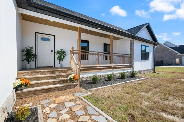 a house view with a backyard space