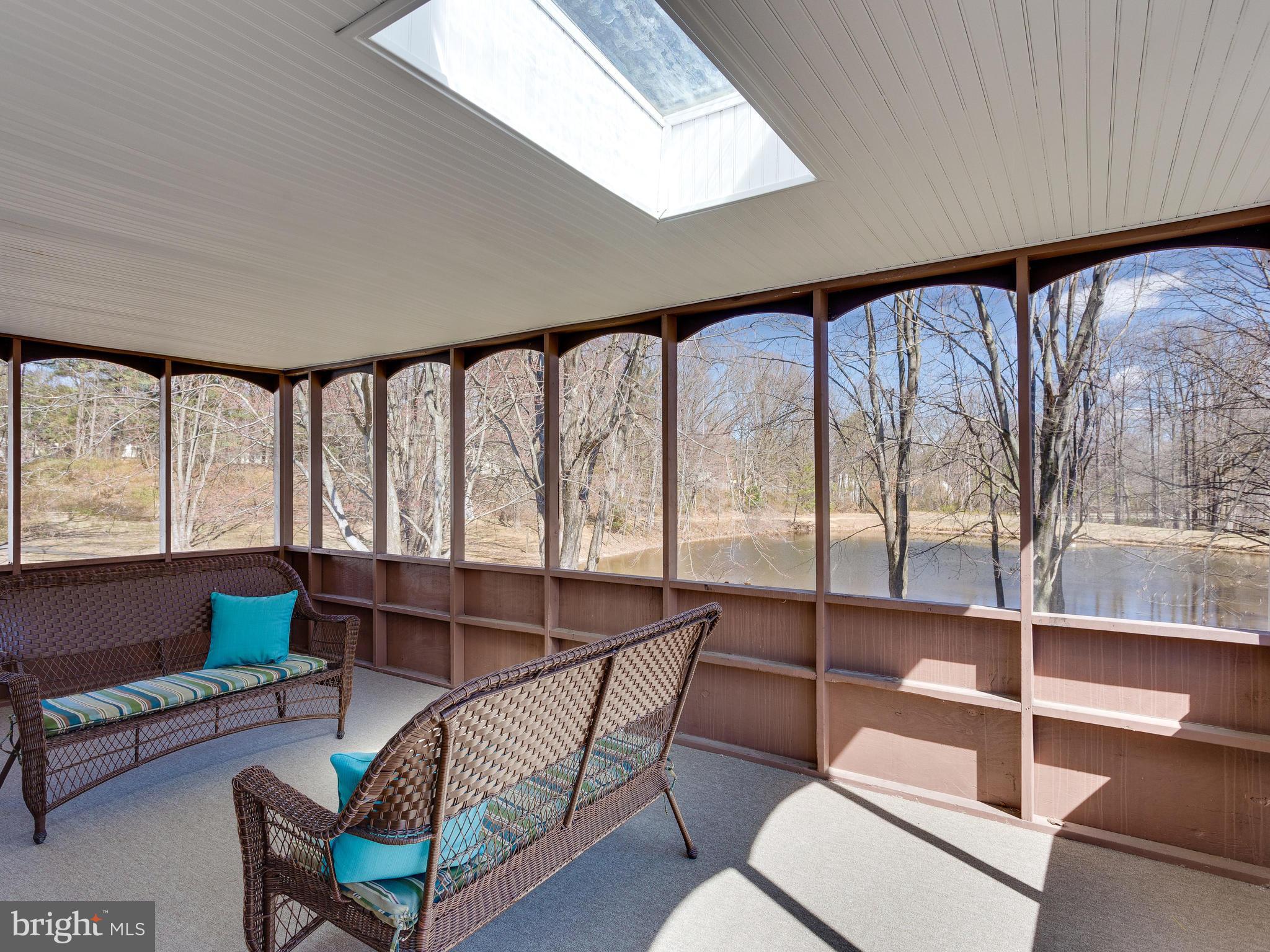 6107 Mantle Road Burke, VA 22015 - Photo 10 of 30 Screened porch with water view!