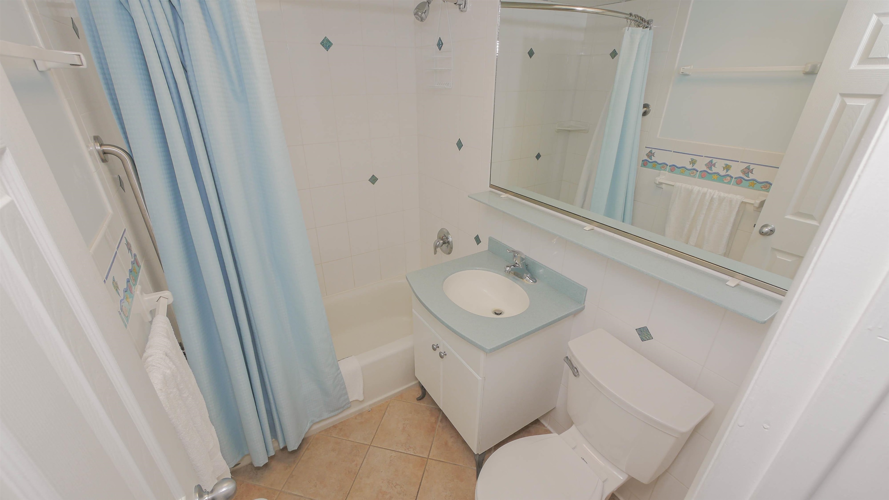 7800 Dune Drive, Unit 209 Avalon, NJ 08202 - Photo 13 of 21 a bathroom with a sink toilet and shower