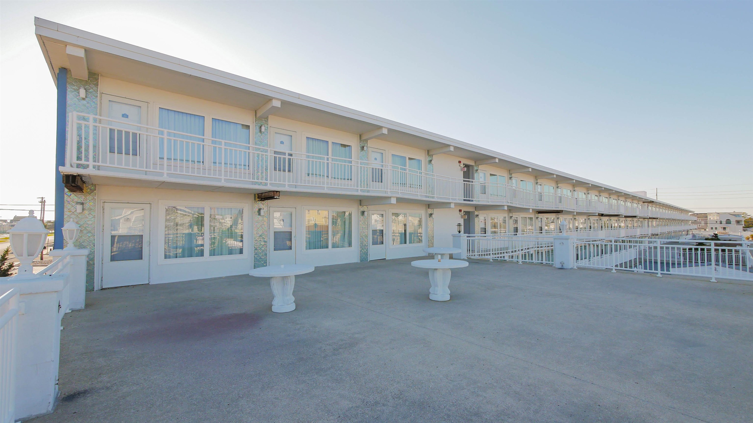7800 Dune Drive, Unit 209 Avalon, NJ 08202 - Photo 21 of 21 a view of an empty room with many windows
