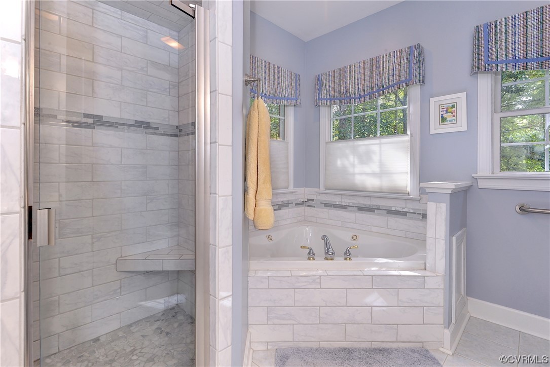 109 Butler Williamsburg, VA 23188 - Photo 19 of 47 a bathroom with a bathtub sink and mirror