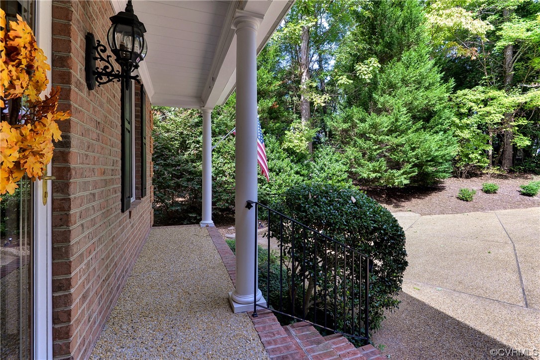 109 Butler Williamsburg, VA 23188 - Photo 2 of 47 a view of a back yard with potted plants