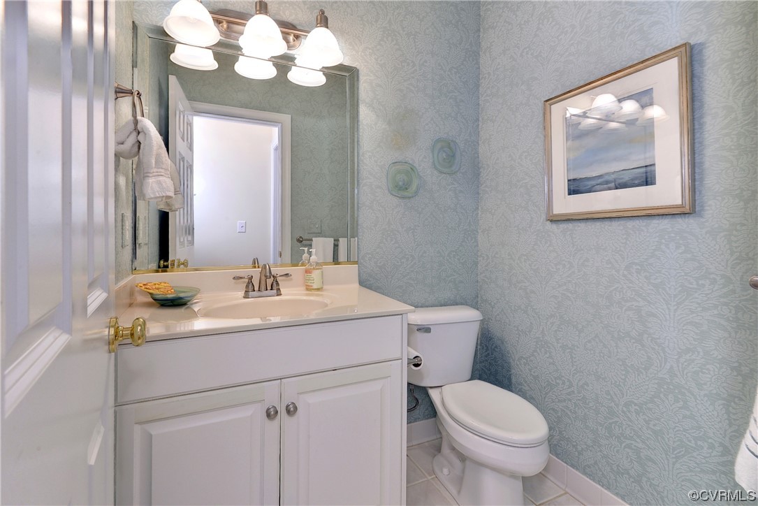 109 Butler Williamsburg, VA 23188 - Photo 21 of 47 a bathroom with a toilet sink and mirror