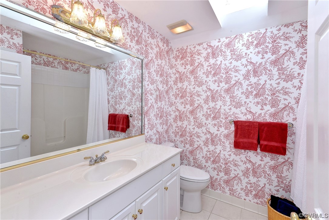 109 Butler Williamsburg, VA 23188 - Photo 26 of 47 a bathroom with a toilet sink and mirror