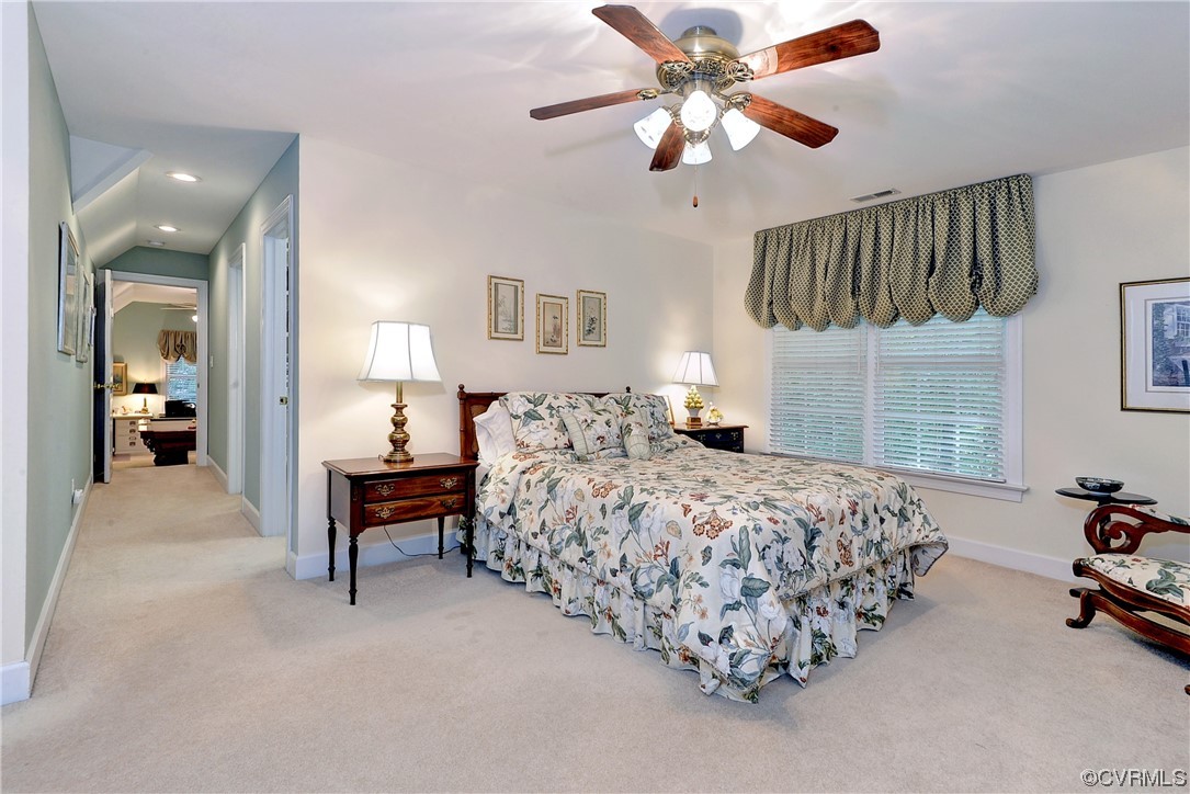 109 Butler Williamsburg, VA 23188 - Photo 28 of 47 a bed room with a bed and a chandelier