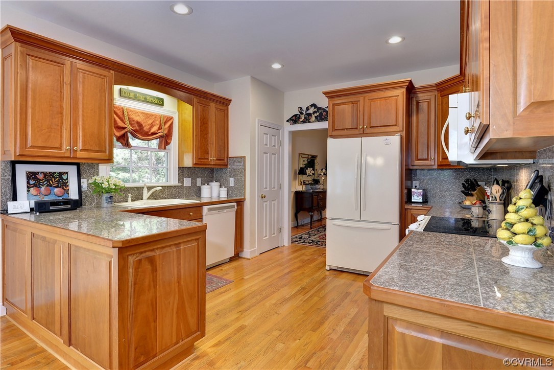 109 Butler Williamsburg, VA 23188 - Photo 9 of 47 a kitchen with stainless steel appliances granite countertop a refrigerator a stove and a sink