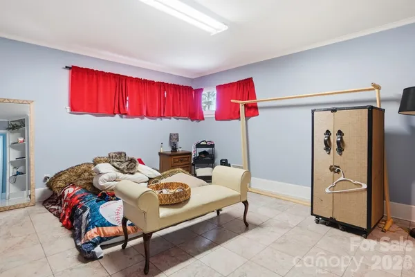 a bedroom with furniture and a bed