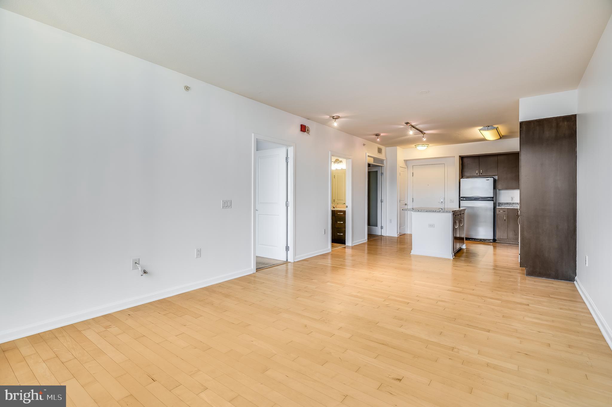 440 L Street Northwest, Unit 913 Washington, DC 20001 - Photo 12 of 42 a view of a livingroom with a staircase