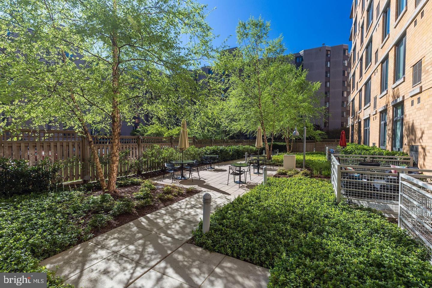 440 L Street Northwest, Unit 913 Washington, DC 20001 - Photo 30 of 42 a view of backyard with outdoor seating and green space