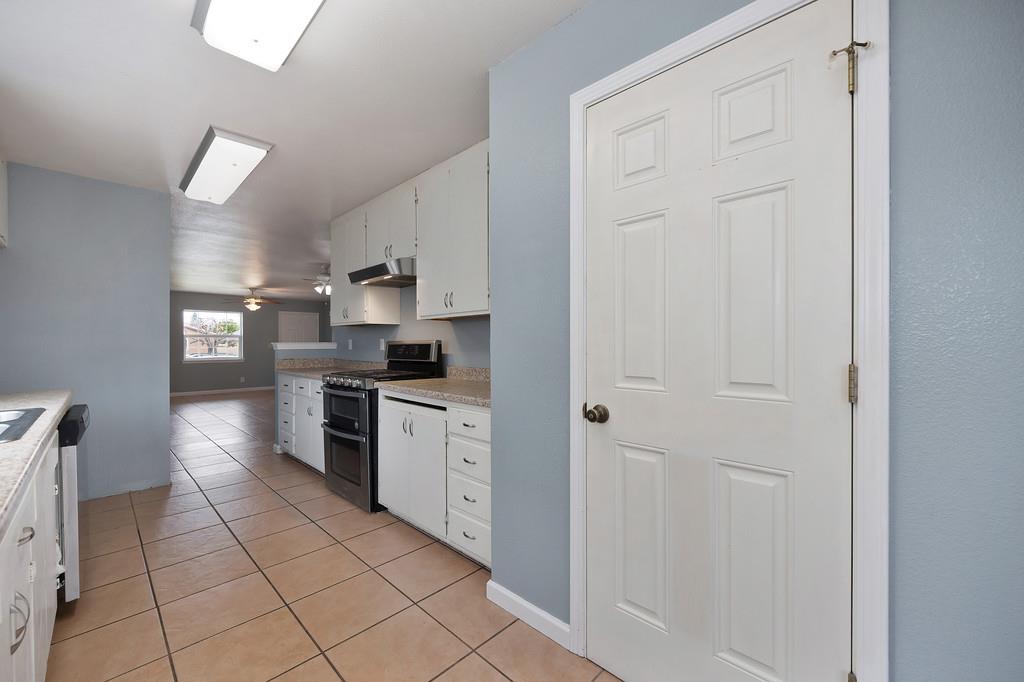 654 B Street Lincoln, CA 95648 - Photo 12 of 39 The kitchen features ample counter and storage space including a large pantry!