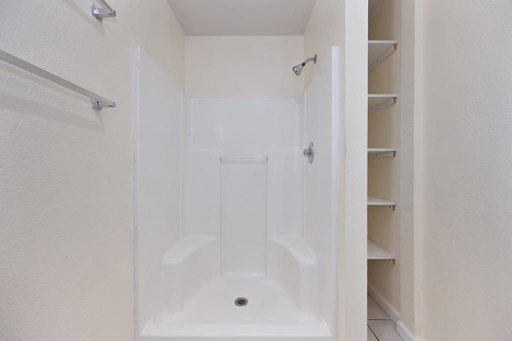 654 B Street Lincoln, CA 95648 - Photo 21 of 39 Primary Bathroom Shower and extra storage!