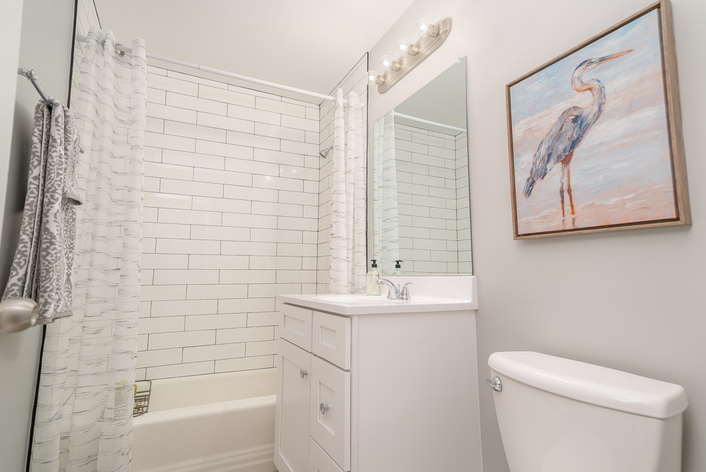 36 South Kensington Avenue, Unit 5 La Grange, IL 60525 - Photo 19 of 23 a bathroom with a sink a toilet and shower