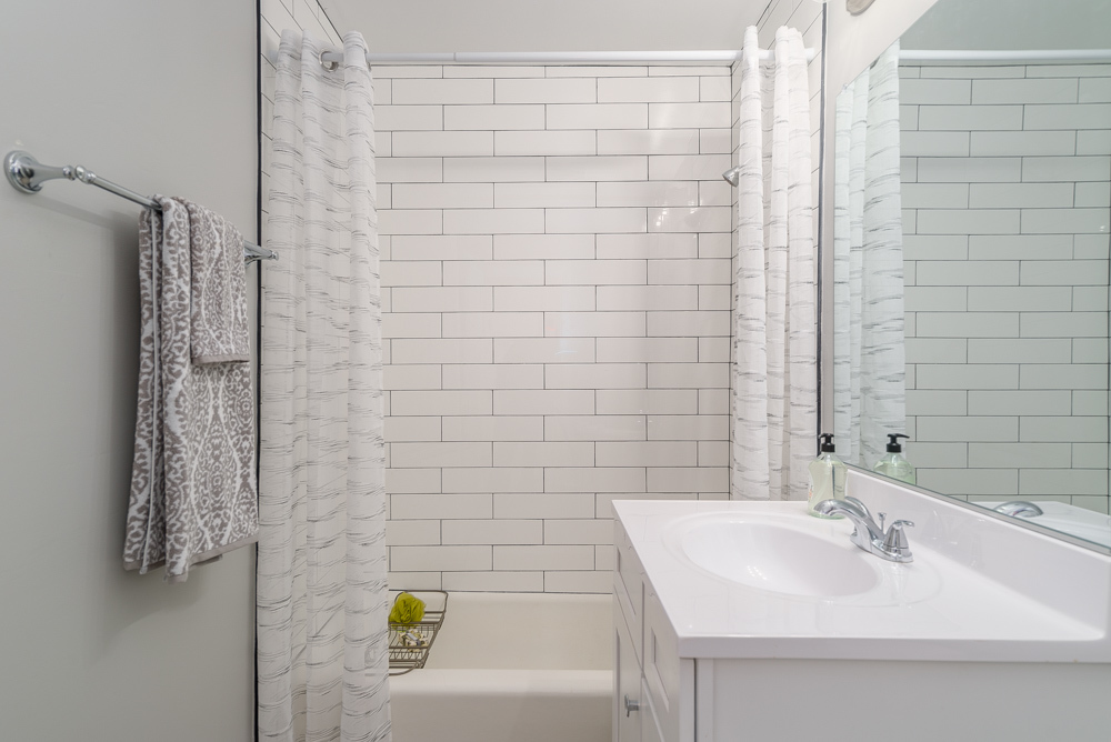 36 South Kensington Avenue, Unit 5 La Grange, IL 60525 - Photo 20 of 23 a bathroom with a sink and a shower