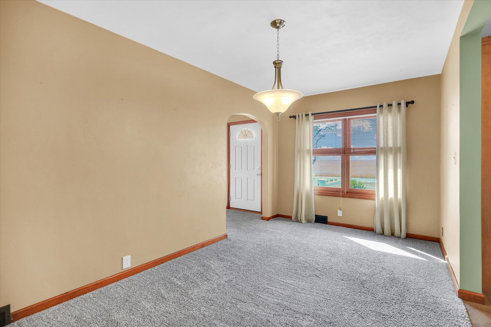 2151 East 2600 North Road Armstrong, IL 61812 - Photo 14 of 56 a view of an empty room with a window