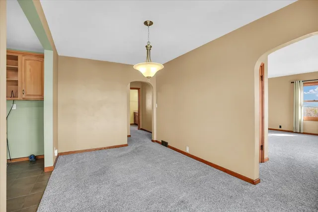 a kitchen that has a sink and a window