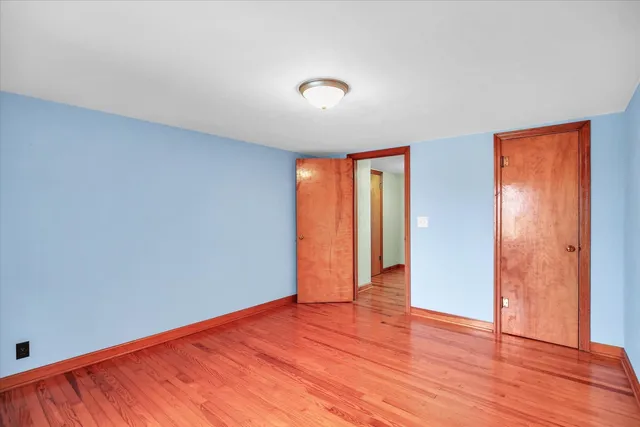 a view of an empty room with a sink
