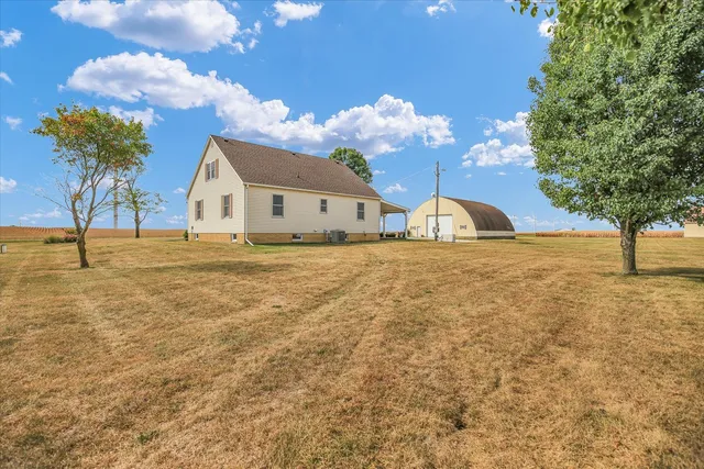 a view of a swimming pool and an outdoor space