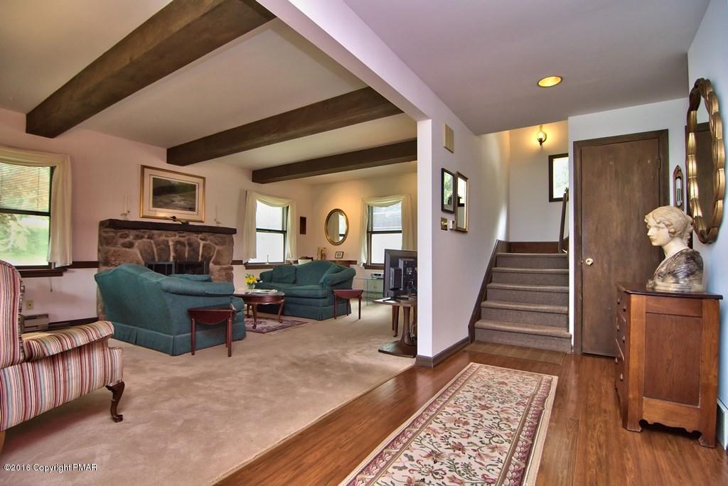 698 Henry Price Road Cresco, PA 18326 - Photo 8 of 71 Foyer into living room