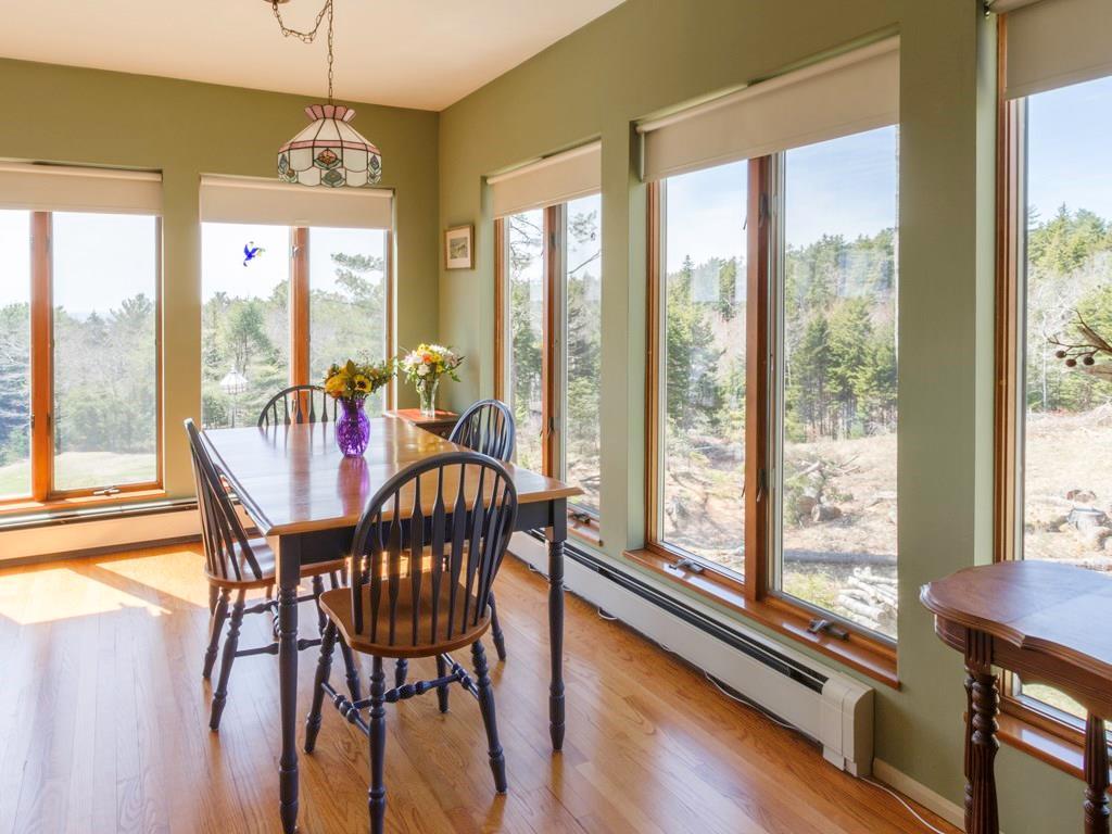 419 Pemaquid Harbor Road Pemaquid, ME 04558 - Photo 13 of 34 Dining area in sunroom with large...