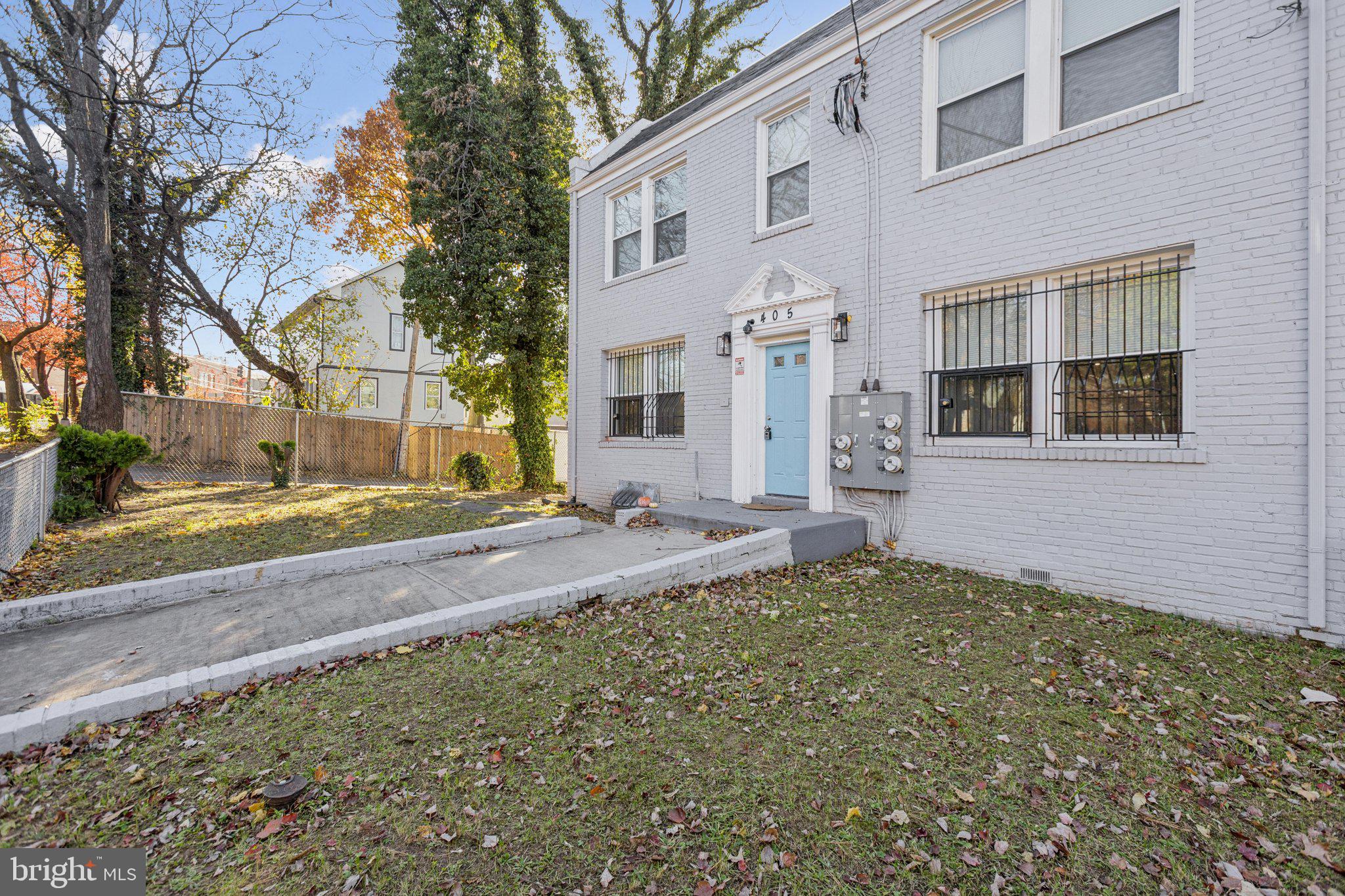 405 34th Street Southeast, Unit 1 Washington, DC 20019 - Photo 2 of 17 a view of a house with a yard