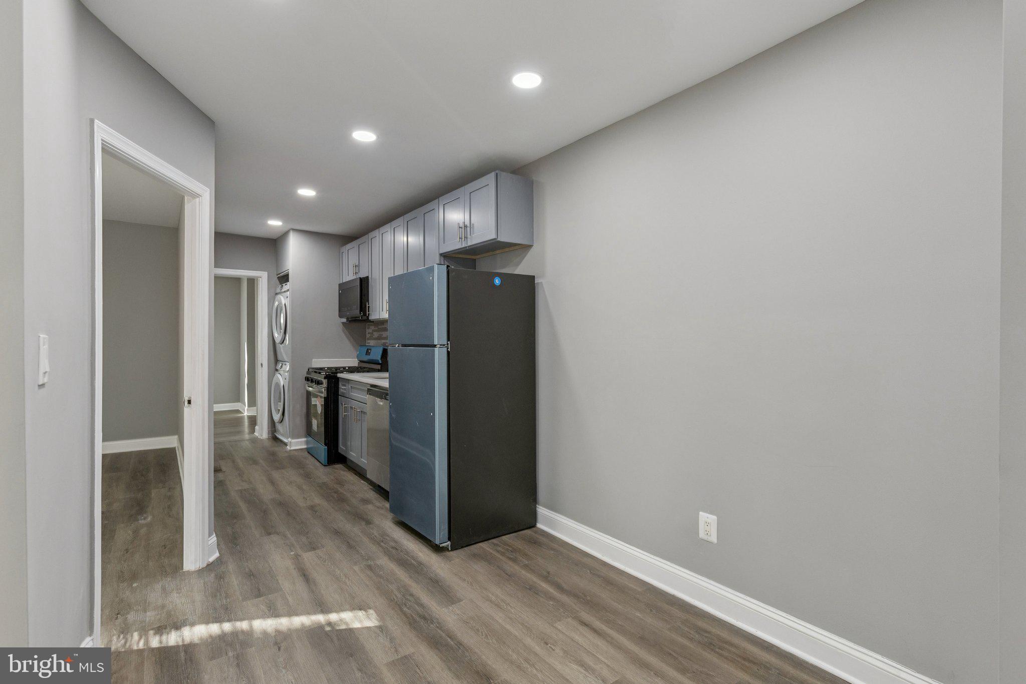 405 34th Street Southeast, Unit 1 Washington, DC 20019 - Photo 8 of 17 a view of kitchen with refrigerator and window