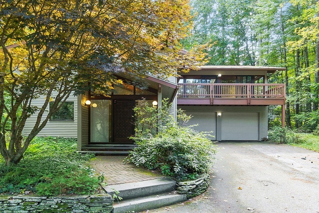 342 Taylor Road Stow, MA 01775 - Photo 2 of 42 front view of a house with a tree