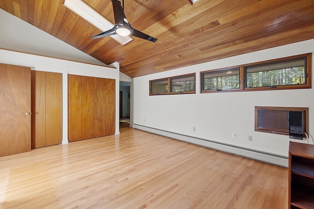 342 Taylor Road Stow, MA 01775 - Photo 26 of 42 a view of an empty room with a window