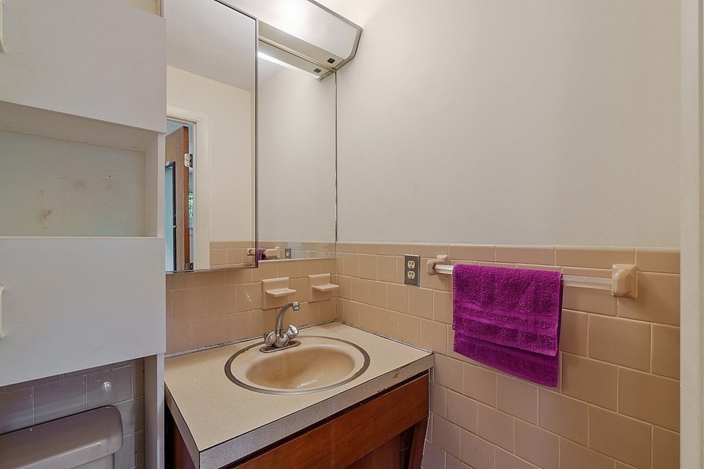 342 Taylor Road Stow, MA 01775 - Photo 27 of 42 a bathroom with a sink and a mirror