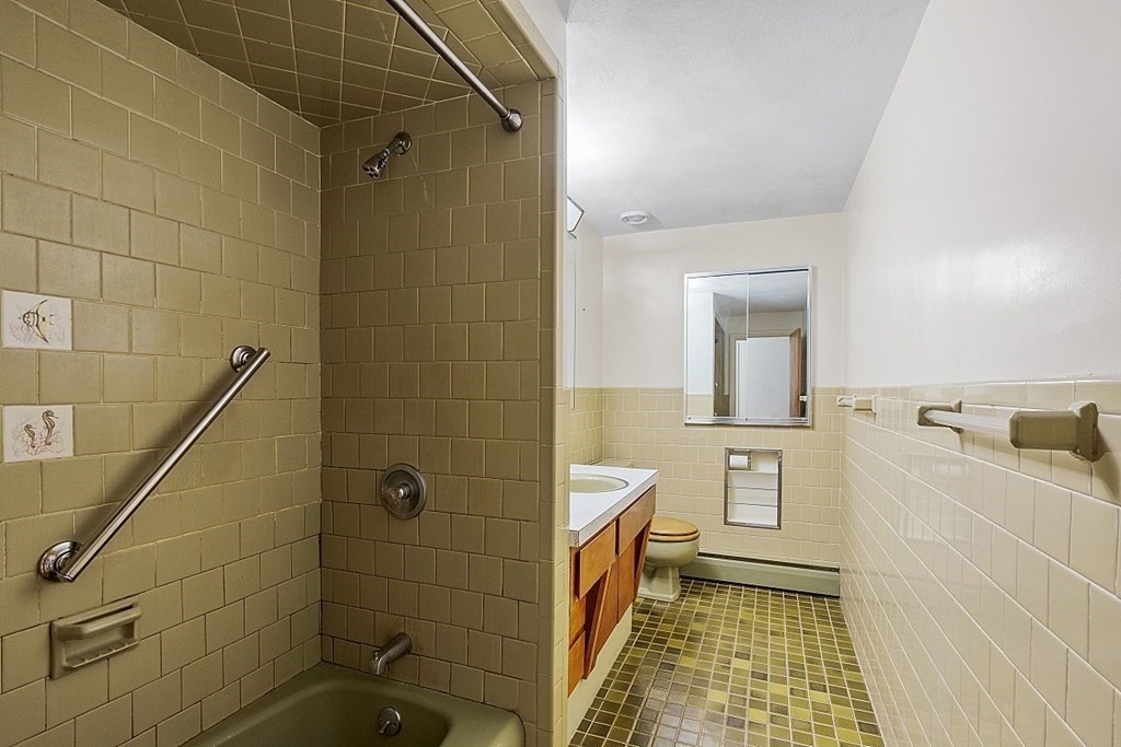 342 Taylor Road Stow, MA 01775 - Photo 31 of 42 a bathroom with a sink a toilet and shower