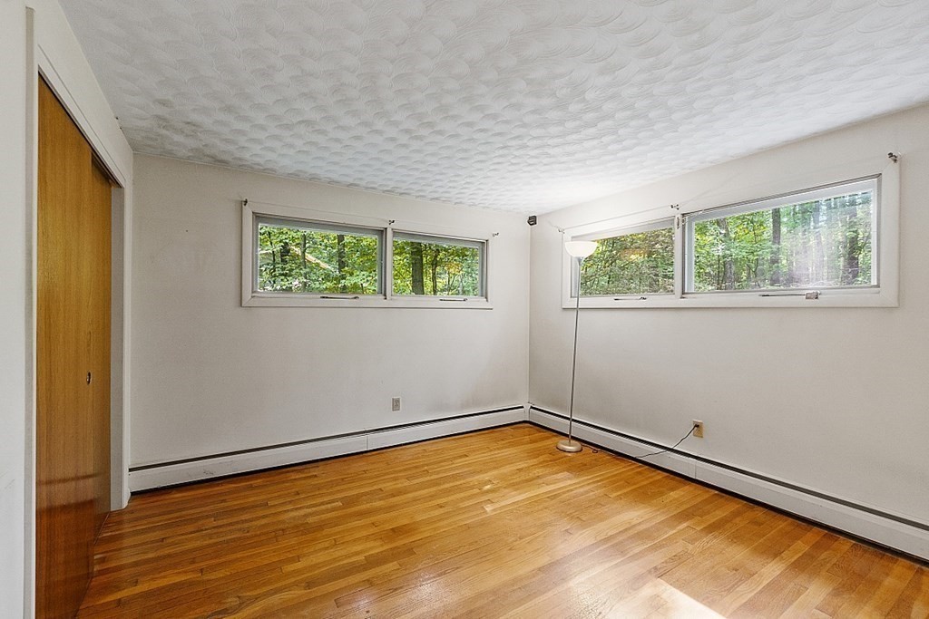 342 Taylor Road Stow, MA 01775 - Photo 33 of 42 an empty room with windows