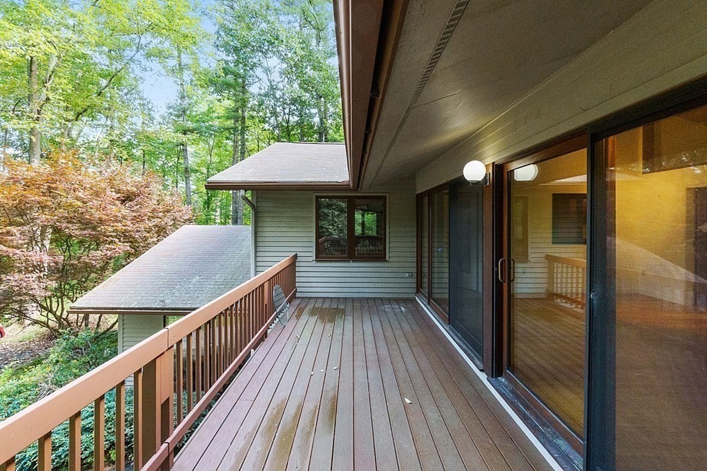 342 Taylor Road Stow, MA 01775 - Photo 37 of 42 a view of balcony with wooden floor